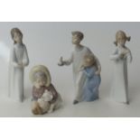 Four Lladro child figures including an Eskimo / Inuit figure with polar bear cub