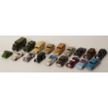 Eighteen Dinky Toys diecast model vehicles including a tank, military vehicles, Daimler ambulance,