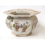 An 18th / 19thC enamelled octagonal Chinese jardiniere, each side decorated with figures,