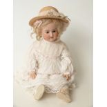 Armand Marseille bisque-headed doll with open mouth, weighted brown eyes,