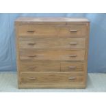 Teak Arts and Crafts chest of five graduated drawers with peg joints and panelled ends W102 x D51 x
