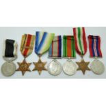 A group of seven WWII medals comprising Africa Star with North Africa 1942-43 clasp, Atlantic Star,
