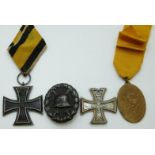 WWI German medals comprising Iron Cross, replica Iron Cross,
