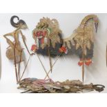 Six Oriental Wayong shadow puppets painted with gilt and pierced decoration