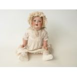 Heubach Koppelsdorf bisque headed doll with open mouth, weighted blue eyes,