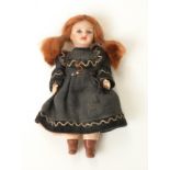 Society Francaise de Fabrication de Bebes et Jouets (SFBJ) miniature bisque headed doll with closed