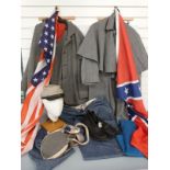 A collection of American Civil War reenactment uniforms and equipment including shirt, overcoat,