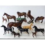 Twelve Beswick / John Beswick figures including horses, foal,