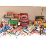 Fifty-six Corgi, Dinky, Spot-On, Britains, Rio, ERTL, Matchbox and similar diecast model vehicles,