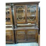 A glazed mahogany bookcase with two door cabinet under,