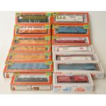 Fourteen Life-Like Trains and Lionel HO/00 gauge wagons and box cars,