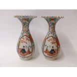 A pair of Japanese vases with flared rim and court scene decoration,