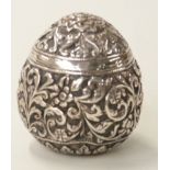 Indian Kutch or similar white metal pepper with embossed decoration, height 4.