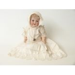 Armand Marseille bisque headed doll with open mouth, weighted brown eyes,