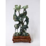 Japanese hardstone carving depicting cranes & lily pads on hardwood stand and in box,