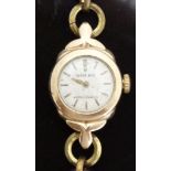 Rolex Precision 9ct gold ladies wristwatch with gold hands and baton markers,