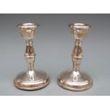 Pair of modern hallmarked silver candlesticks, Birmingham 1969 maker W I Broadway & Co, 10.