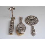 Hallmarked silver three piece dressing table set and a hallmarked silver trumpet vase