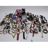 A collection of approximately ninety ladies and gentleman's mostly contemporary wristwatches