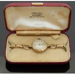 Ladies 9ct gold wristwatch with inset subsidiary seconds dial,