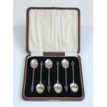 Cased set of hallmarked silver coffee bean spoons,