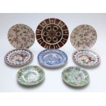 Eight plates including Crown Derby Imari 1128, Chinese famille rose,