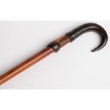 A 19thC/20thC Black Forest walking / climbing stick with chamois horn and slot handle,