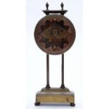 A 19thC brass gravity / mystery clock with visible movement,