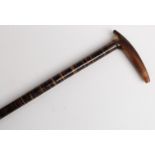 19thC horn-handled walking stick, the shaft formed as laminated discs of horn,