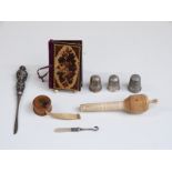 Sewing related items including two hallmarked silver thimbles,