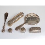 A quantity of hallmarked silver mounted dressing table items comprising hand mirror, shoe horn,