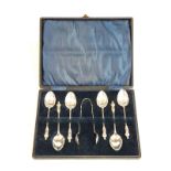 Cased set of hallmarked silver apostle teaspoons and tongs Birmingham 1910,