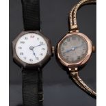 Ladies 9ct gold wristwatch with blued hands, Arabic numerals and engine turned face,