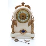 A 19thC alabaster cased clock flanked by semi clad winged figures holding laurel wreaths with blue