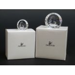 A pair of Swarovski Crystal cut glass signed special event paperweights Columbine,