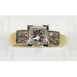 A 18ct gold ring set with a princess cut diamond of approximately 0.