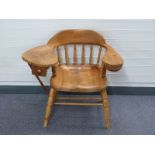 Arts and Crafts bespoke elm elbow chair with drawer to one arm and swivel container to other