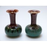 Two Sir Christopher Dresser for Linthorpe Pottery vases, one impressed HT and 363,