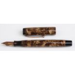 Parker Duofold fountain pen with marbled brown barrel and cap, gold plated clip and 14K gold nib,