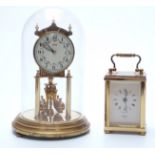 A 20thC English brass carriage clock in corniche style case,