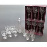 Baccarat decanter with four similarly decorated glasses together with a boxed set of six French cut