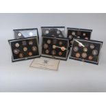Royal Mint proof coin collections comprising 1983, 1984, 1985, 1986, 1987 and 1988,