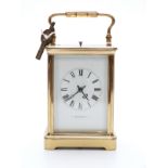 Late 19th / early 20thC gilt brass French carriage clock in corniche style case,