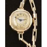 Ladies 9ct gold wristwatch with blued Breguet hands, black Arabic numerals,