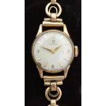 Omega 9ct gold ladies wristwatch with gold hands, Arabic numerals, baton markers,