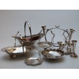 A collection of plated ware including swing handled baskets, stand with epergnes,
