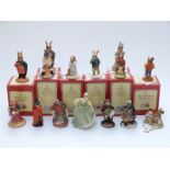 Nine Royal Doulton Bunnykins figures comprising Fortune Teller, Fisherman, Sheriff of Nottingham,