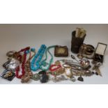 A large collection of costume jewellery including turquoise necklace, coral necklace, brooches,