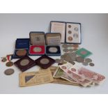 A collection of largely UK coins including uncirculated Coronation 1953 set, silver crowns,
