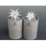 Set of two graduated Swarovski Crystal cut glass Star Candle Holders, largest 13.